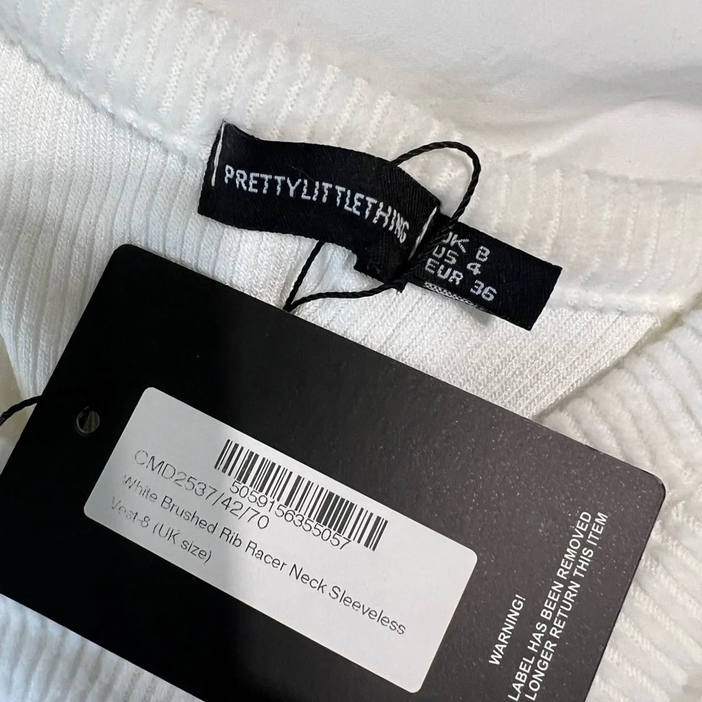 PrettyLittleThing Ivory Ribbed Tank Top - Picture 2 of 3
